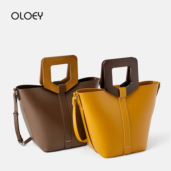 vintage fashion female tote bag 2019 new quality pu leather women's wooden handle handbag shopping messenger bag bolsas
vintage fashion female tote bag 2019 new quality pu leather women's wooden handle handbag shopping messenger bag bolsas