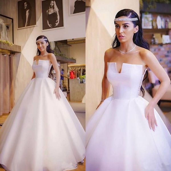 strapless a line wedding dresses 2020 satin tulle floor length ball gown arabic sleeveless wedding gowns with pearls, White
strapless a line wedding dresses 2020 satin tulle floor length ball gown arabic sleeveless wedding gowns with pearls, White