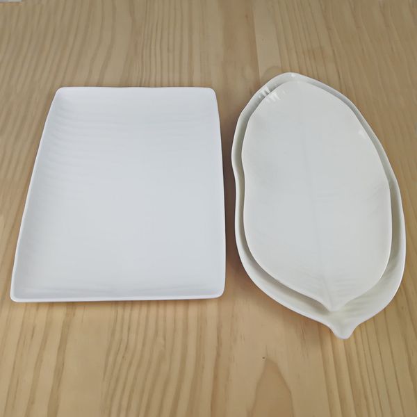 high-grade a5 melamine dinnerware white dinner plate banana leaf lrregular dish western restaurant porcelain imitation tableware
high-grade a5 melamine dinnerware white dinner plate banana leaf lrregular dish western restaurant porcelain imitation tableware