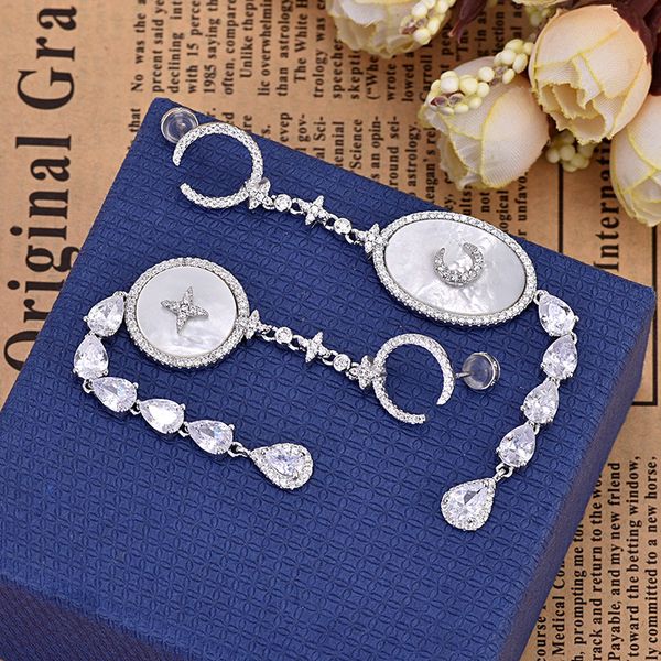 european and american zircon inlaid star moon pendant asymmetric earrings jewelry luxury generous personality wild silver color earrings, Golden
european and american zircon inlaid star moon pendant asymmetric earrings jewelry luxury generous personality wild silver color earrings, Golden