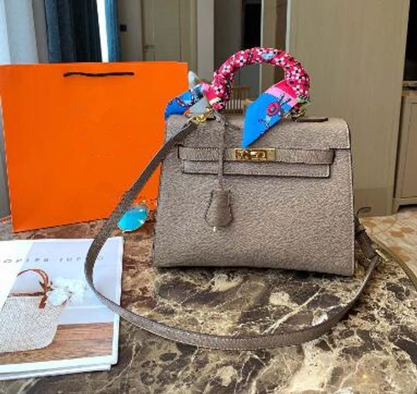 роскошные дизайнерские сумки сумки на ремне 27 см с замком ключ женщины сумка воловьей кожи кошельки натуральная кожа сумка высокое качество 
роскошные дизайнерские сумки сумки на ремне 27 см с замком ключ женщины сумка воловьей кожи кошельки натуральная кожа сумка высокое качество