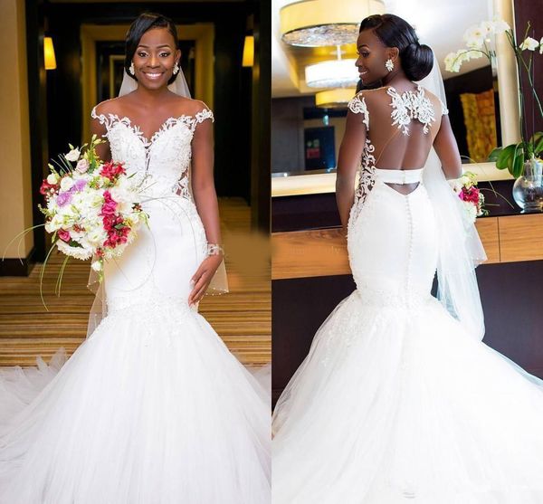 sheer neck capped sleeves lace mermaid wedding dresses gorgeous appliqued tulle hollow back african church wedding bridal gowns, White
sheer neck capped sleeves lace mermaid wedding dresses gorgeous appliqued tulle hollow back african church wedding bridal gowns, White