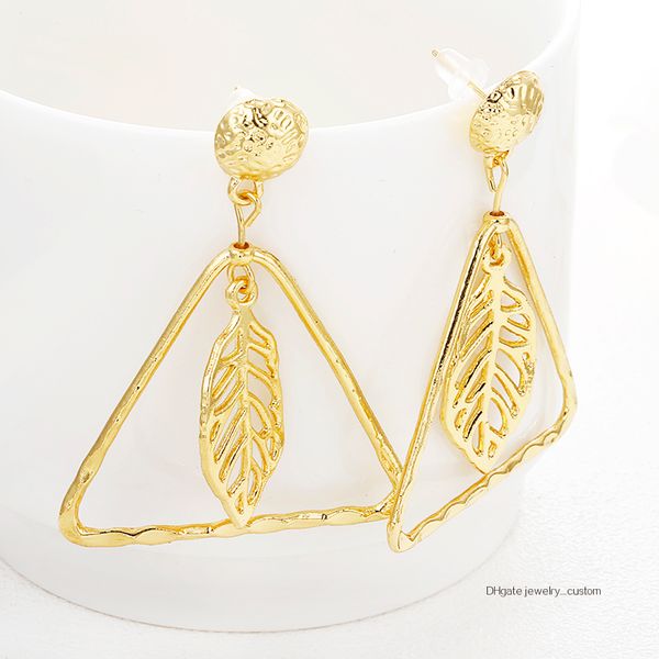 European And American Fashion Hollow Out Triangle Earrings Golden Color Leaf Earrings For Woman Gift Elegant Drop Earrings E0492
European And American Fashion Hollow Out Triangle Earrings Golden Color Leaf Earrings For Woman Gift Elegant Drop Earrings E0492