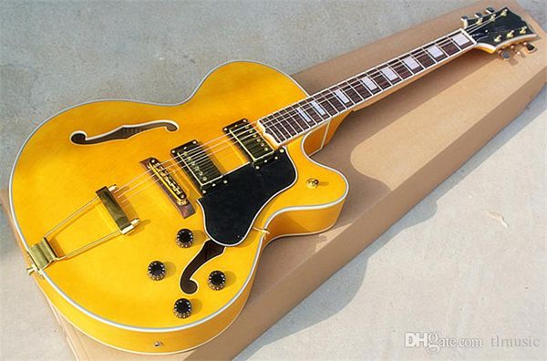 Yellow hollow jazz electric guitar with hh pickup and golden hardware double binding and double f hollow pull rod bridge
Yellow hollow jazz electric guitar with hh pickup and golden hardware double binding and double f hollow pull rod bridge