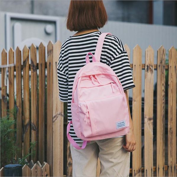 

The Korean version of the pure-color canvas double shoulder bag fashion personality travel backpack 2019 new art leisure student schoolbag