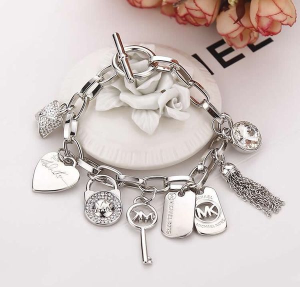 

Home&gt; Jewelry&gt; Bracelets&gt; Charm Bracelets&gt; Product detail Luxury Bracelet Men's Women's Heart Tassel Key Charm Pendant Cuff Bracelet New J