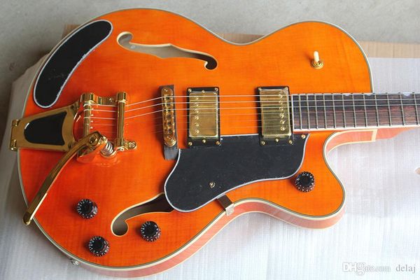 i018 new custom orange semi-hollow electric guitar with white binding,black pickguard,maple neck,tremolo system,offer customized
i018 new custom orange semi-hollow electric guitar with white binding,black pickguard,maple neck,tremolo system,offer customized
