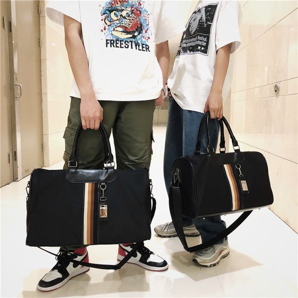fashion business travel bag female baggage short-haul portable boarding bag simple travel female sports men's gym
fashion business travel bag female baggage short-haul portable boarding bag simple travel female sports men's gym
