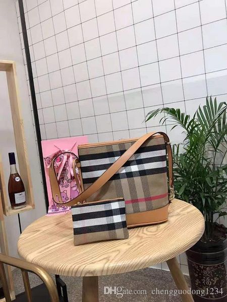 the new fashion web celebrity with super fire plaid canvas bucket handbags leather large capacity one shoulder his female bag messenger bags
the new fashion web celebrity with super fire plaid canvas bucket handbags leather large capacity one shoulder his female bag messenger bags