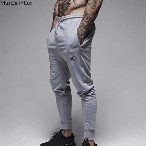 new brand print logo gyms men joggers casual men sweatpants workout fitness cotton trousers fashion skinny track pants, Black
new brand print logo gyms men joggers casual men sweatpants workout fitness cotton trousers fashion skinny track pants, Black
