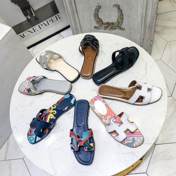 Summer black or white ladies sandals ladies designer sandals real cowhide shoes flat shoes slippers women fashiona
Summer black or white ladies sandals ladies designer sandals real cowhide shoes flat shoes slippers women fashiona