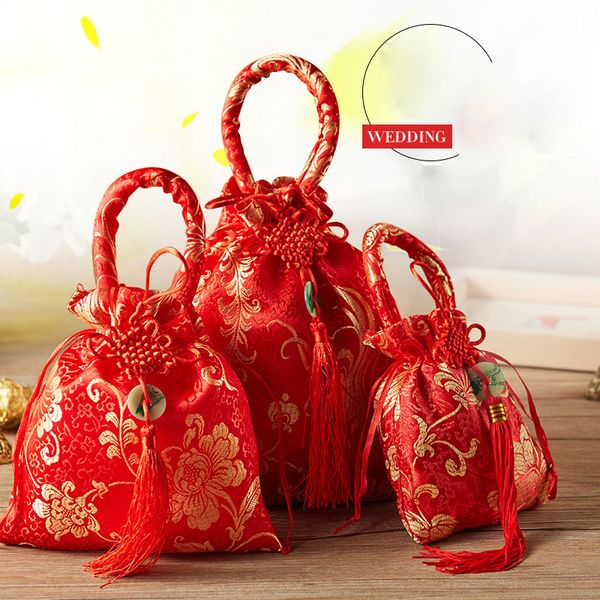 chinese style red candy bags with tassel wedding party candy boxes 
chinese style red candy bags with tassel wedding party candy boxes