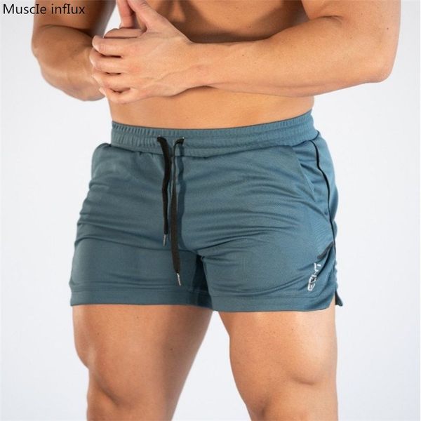 2019 summer beach shorts mens fitness bodybuilding breathable quick drying short gyms men casual joggers shorts, White;black
2019 summer beach shorts mens fitness bodybuilding breathable quick drying short gyms men casual joggers shorts, White;black