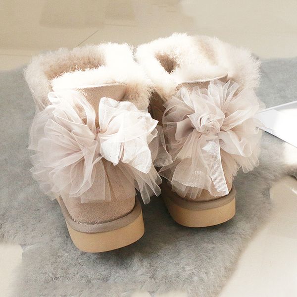 genuine sheepskin leather woman snow boots 100% natural fur women's boots with bow warm wool winter fashion ankle shoes, Black
genuine sheepskin leather woman snow boots 100% natural fur women's boots with bow warm wool winter fashion ankle shoes, Black
