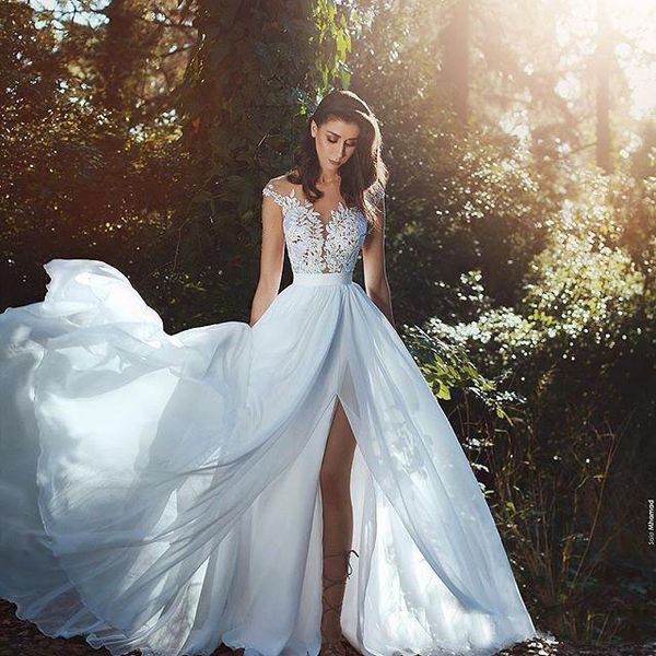 2019 A Line Cheap Chiffon Wedding Dresses See Through Jewel Neck Lace Appliques Sleeveless Bridal Gowns ashion Side Split Wedding Dresses
2019 A Line Cheap Chiffon Wedding Dresses See Through Jewel Neck Lace Appliques Sleeveless Bridal Gowns ashion Side Split Wedding Dresses