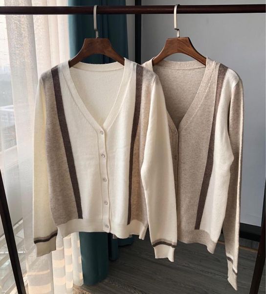 cashmere wool women knitted cardigan v-neck thin slim knitted sweater single-breasted female coat, White
cashmere wool women knitted cardigan v-neck thin slim knitted sweater single-breasted female coat, White