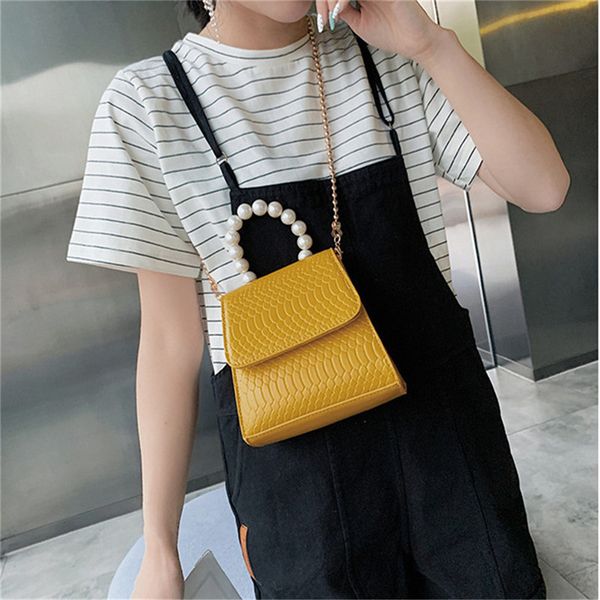2020 new totes with pearl handle mini chain shoulder messenger bag girls crossbody bags crocodile pattern pu leather bags women
2020 new totes with pearl handle mini chain shoulder messenger bag girls crossbody bags crocodile pattern pu leather bags women