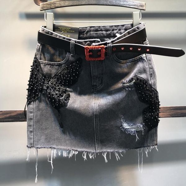 2020 autumn new fashion women beading denim skirt tassel butterfly patch slim package hip a-line jeans skirt, Black
2020 autumn new fashion women beading denim skirt tassel butterfly patch slim package hip a-line jeans skirt, Black