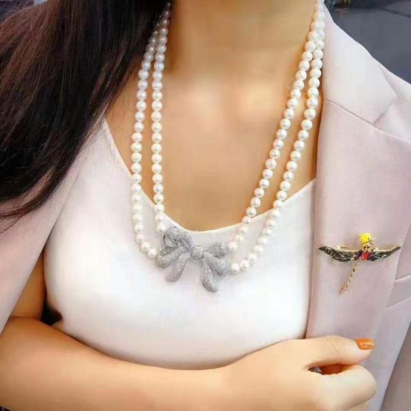 hand knotted 70-75cm 7-8mm white freshwater pearl butterfly micro inlay zircon accessories necklace, Silver
hand knotted 70-75cm 7-8mm white freshwater pearl butterfly micro inlay zircon accessories necklace, Silver