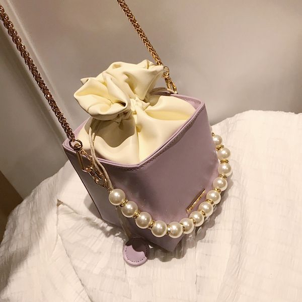 pearl packet western style 2020 летний новый дикий pu текстуры кожи женские сумки на ремне цепи моды сумки на ремне
pearl packet western style 2020 летний новый дикий pu текстуры кожи женские сумки на ремне цепи моды сумки на ремне