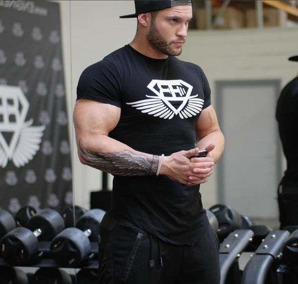 

2018 year new men's fitness body engineers brand summer strong and handsome man irregular round collar t-shirt with short sleeve, White;black