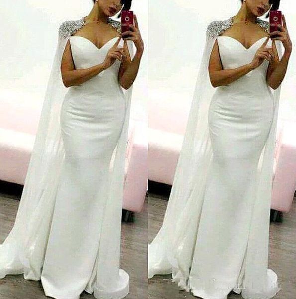 2019 Newest Arabic White Capped Satin Mermaid Long Evening Dresses Applique Beaded Formal Party Gowns Ruched Sleeveless Prom Dresses
2019 Newest Arabic White Capped Satin Mermaid Long Evening Dresses Applique Beaded Formal Party Gowns Ruched Sleeveless Prom Dresses
