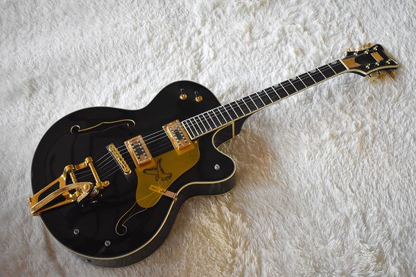 factory semi-hollow black electric guitar with tremolo system,gold hardware,cream binding body and neck,can be customize
factory semi-hollow black electric guitar with tremolo system,gold hardware,cream binding body and neck,can be customize