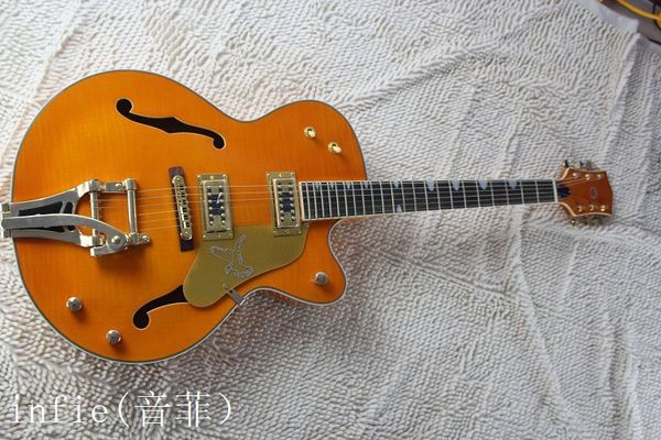 Jazz electric guitar with vibrato hollow body guitar amber colour