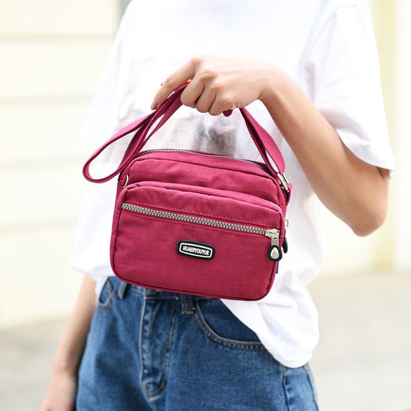 new ladies messenger bag nylon waterproof shoulder bag elegant daily small square multi-function messenger sac femme
new ladies messenger bag nylon waterproof shoulder bag elegant daily small square multi-function messenger sac femme