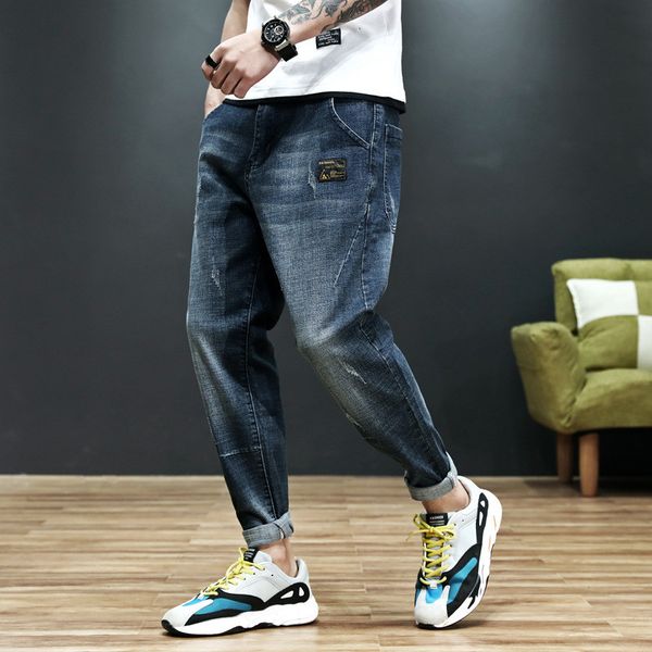 solid color scratched men's jeans black blue loose casual male denim trousers appliques sweatpants joggers pants harem pants 
solid color scratched men's jeans black blue loose casual male denim trousers appliques sweatpants joggers pants harem pants