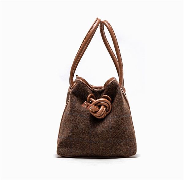 designer handbag autumn and winter design cloth drawstring button bucket bags thousand bird pattern simple lamb hair bag shoulder bags 3
designer handbag autumn and winter design cloth drawstring button bucket bags thousand bird pattern simple lamb hair bag shoulder bags 3
