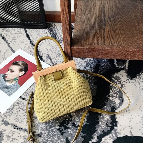 new retro wool handbag wooden handle clip bucket bag buckle women shoulder messenger bag clutch purse bolso femenino
new retro wool handbag wooden handle clip bucket bag buckle women shoulder messenger bag clutch purse bolso femenino