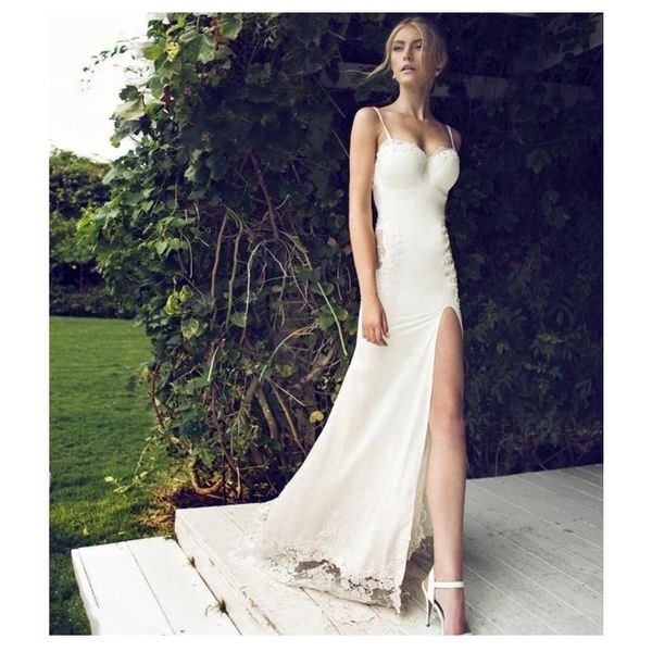 mermaid wedding dress appliques lace spaghetti straps wedding gown white ivory backless beach bride dresse
mermaid wedding dress appliques lace spaghetti straps wedding gown white ivory backless beach bride dresse