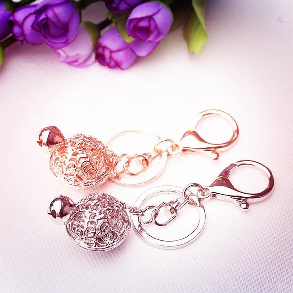 new fashion hollow carved gold and silver bell keychain diy metal chain car keychains key pendant
new fashion hollow carved gold and silver bell keychain diy metal chain car keychains key pendant