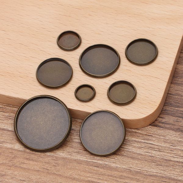 50 pcs round cabochon base tray antique bronze plated copper connector diy jewelry making accessories, Blue;slivery
50 pcs round cabochon base tray antique bronze plated copper connector diy jewelry making accessories, Blue;slivery