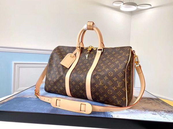 genuine leather designer men duffle bag women travel bags hand luggage luxury designer travel bag
genuine leather designer men duffle bag women travel bags hand luggage luxury designer travel bag