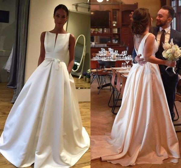 simple satin wedding dresses a line modest v neck backless puffy country garden bridal gowns with pocket custom made beautiful wedding dress, White
simple satin wedding dresses a line modest v neck backless puffy country garden bridal gowns with pocket custom made beautiful wedding dress, White