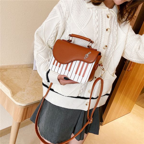 фортепианный узор женщины кожа crossbody messenger сумка женщины лоскут сумка bolsa feminina сумка
фортепианный узор женщины кожа crossbody messenger сумка женщины лоскут сумка bolsa feminina сумка