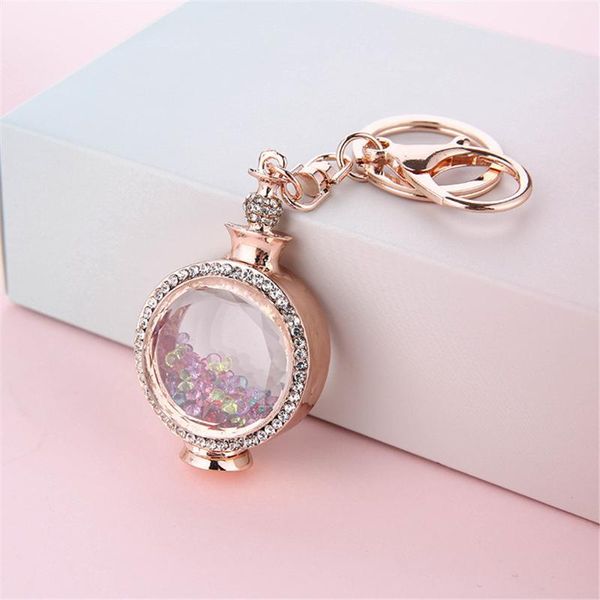 keychains imitate metal perfume bottle keychain style car key chain pendant exquisite jewelry fashion ladies findings joyas, Silver
keychains imitate metal perfume bottle keychain style car key chain pendant exquisite jewelry fashion ladies findings joyas, Silver