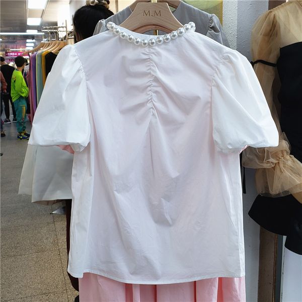2020 spring and summer new short-sleeved white shirts female nail pearl pleated solid puff sleeve loose shirt women blosues
2020 spring and summer new short-sleeved white shirts female nail pearl pleated solid puff sleeve loose shirt women blosues
