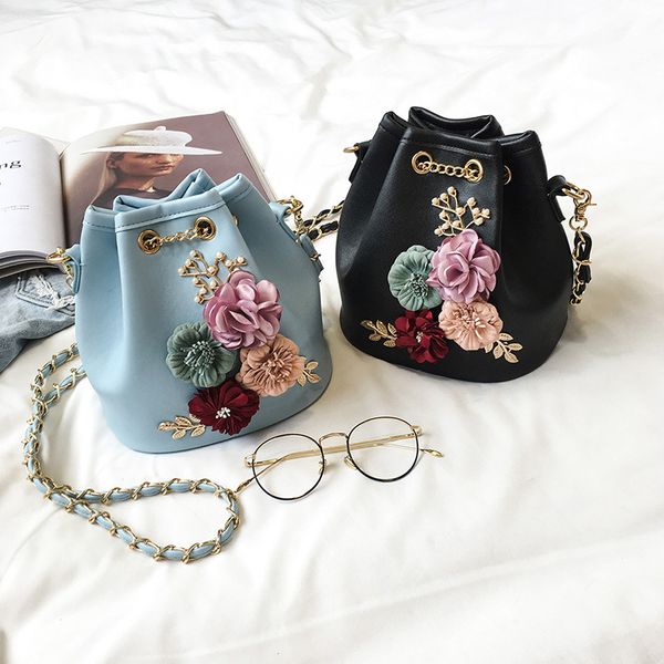 fashion new women's bag fashion solid color bucket bag flower small fresh shoulder messenger
fashion new women's bag fashion solid color bucket bag flower small fresh shoulder messenger