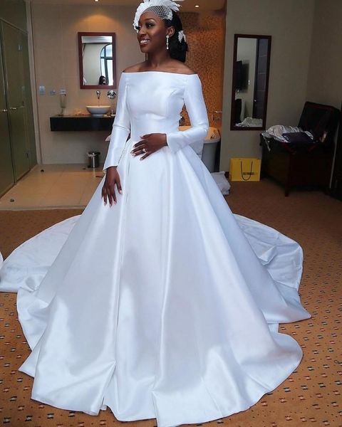 fall 2019 vintage plain satin wedding dresses vintage bateau neck long sleeves a line court train trendy african bridal gowns, White
fall 2019 vintage plain satin wedding dresses vintage bateau neck long sleeves a line court train trendy african bridal gowns, White