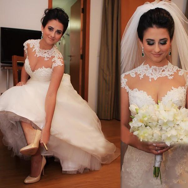 White Elegant Winter Wedding Dresses 2019 Sheer High Neck Appliqued Tulle A-Line Bridal Gowns Sheer Cap Sleeve Bridal Dress Custom Made 
White Elegant Winter Wedding Dresses 2019 Sheer High Neck Appliqued Tulle A-Line Bridal Gowns Sheer Cap Sleeve Bridal Dress Custom Made