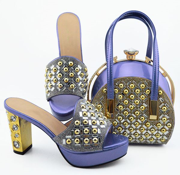 good selling violet women dress shoes with rhinestone decoration african pumps match handbag set md007,heel 10cm, Black
good selling violet women dress shoes with rhinestone decoration african pumps match handbag set md007,heel 10cm, Black
