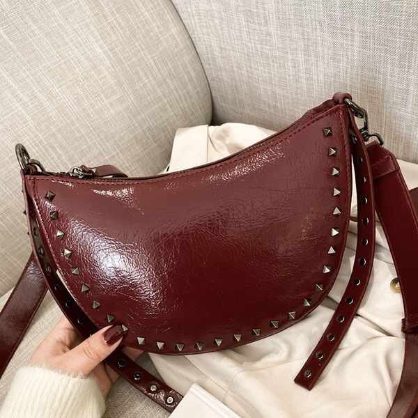 new fashion women bag trend wild solid color rivet shoulder bag messenger saddle women leather handbags
new fashion women bag trend wild solid color rivet shoulder bag messenger saddle women leather handbags