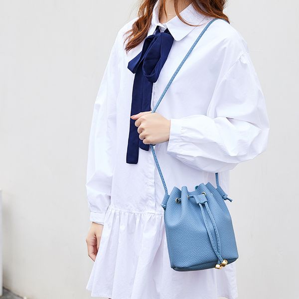 litchi pattern small bag 2020 korean new women's bag casual shoulder messenger drawstring bucket
litchi pattern small bag 2020 korean new women's bag casual shoulder messenger drawstring bucket