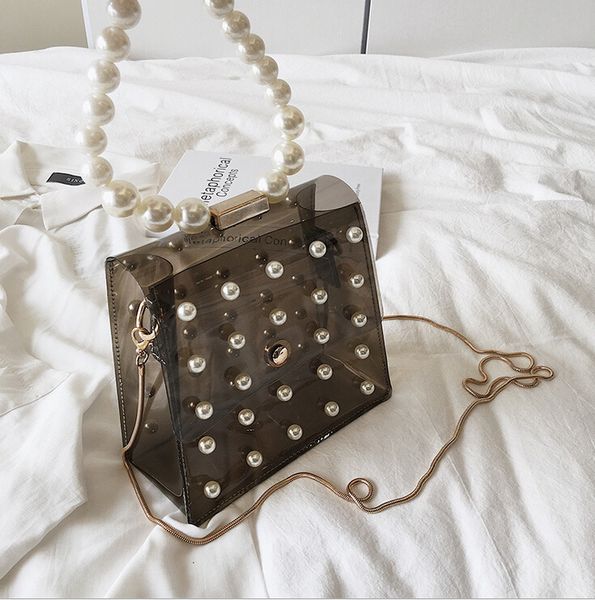 clear women handbag 2019 pearls fashion bags for women transparent pvc girls evening party bag fashion casual tote
clear women handbag 2019 pearls fashion bags for women transparent pvc girls evening party bag fashion casual tote