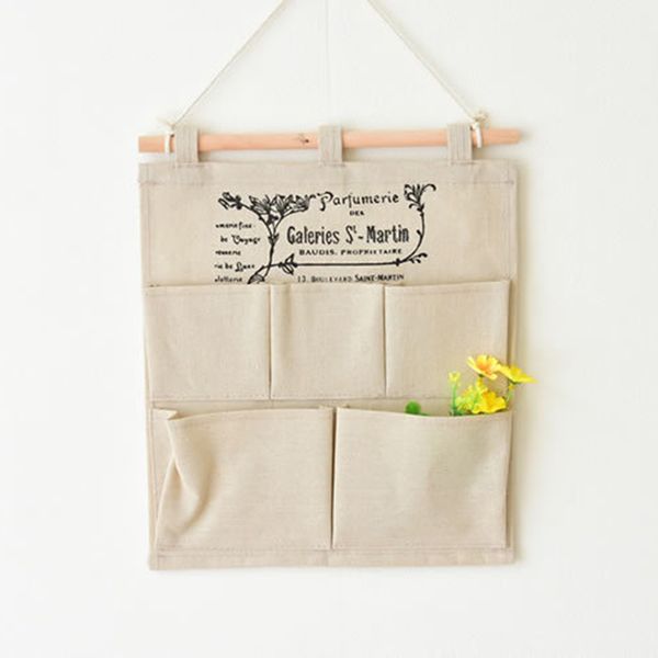 plain cotton and linen five pockets english storage hanging bag remote control toy sundries storage hanging bag wall decoration
plain cotton and linen five pockets english storage hanging bag remote control toy sundries storage hanging bag wall decoration