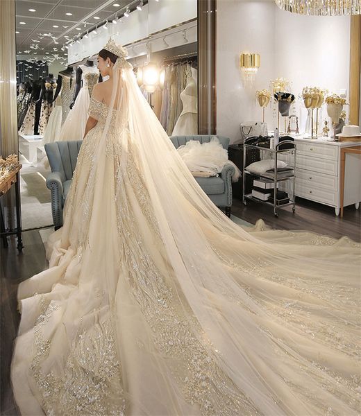 luxury champagne lace appliqued a-line wedding dresses vintage long sleeves jewel beaded saudi arabic dubai bridal gown, White
luxury champagne lace appliqued a-line wedding dresses vintage long sleeves jewel beaded saudi arabic dubai bridal gown, White