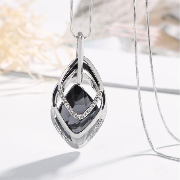 sweater necklace triangle row-type blue crystal pendant alloy part small crystal setting silver plated brass long chain
sweater necklace triangle row-type blue crystal pendant alloy part small crystal setting silver plated brass long chain